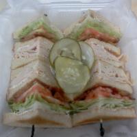 Turkey Club Sandwich · Turkey, bacon, lettuce and tomato stacked high on your choice of white, wheat, or rye bread ...
