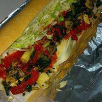 Grilled Veggie Hoagie · Broccoli rabe, spinach, raw onions, roasted red peppers, mushrooms, lettuce, tomato, and sha...