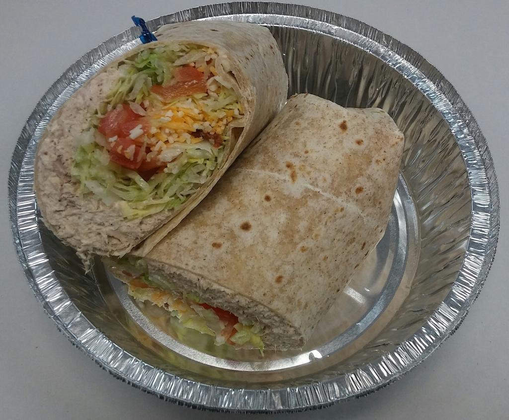 Tuna Club Wrap · Tuna salad, lettuce, tomato, cheddar cheese and bacon on your choice of a white, wheat, or garlic herb wrap