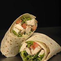 Chicken Caesar Wrap · Diced chicken breast, romaine lettuce, tomato, parmesan cheese, and Caesar dressing served o...
