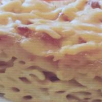 Mac & Cheese · Macaroni pasta in a cheese sauce.

