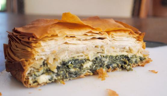 Spinach Pie  · One slice of our delicious Spinach pie made with Spinach, Feta Cheese, Red Onions and Phyllo dough