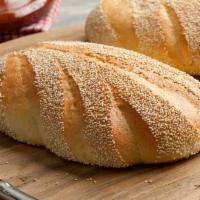 Italian Bread Loaf · Crusty yeast raised bread with sesame seeds; can be used as large hero