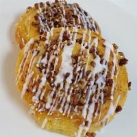 Pecan Danish · Danish topped with pecans and icing