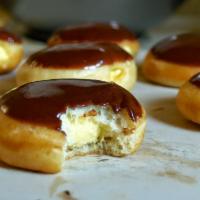 Boston Cream Doughnut · Donut filed with custard cream and topped with either Chocolate or Vanilla icing