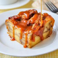 Bread Pudding Slice · A slice of our appetizing dense pudding made with Danishes and Fruit