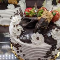 Cannoli Cake · Vanilla cake with cannoli cream and chocolate chips covered in whipped cream (6-8 servings) ...