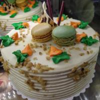 Carrot Cake · Carrot cake with raisins and cream cheese icing. No nuts unless you specify (6-8 servings) P...
