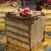 Seven Layer Cake · Vanilla cake with Chocolate buttercream between layers (4-5 servings) Please give at least 1...