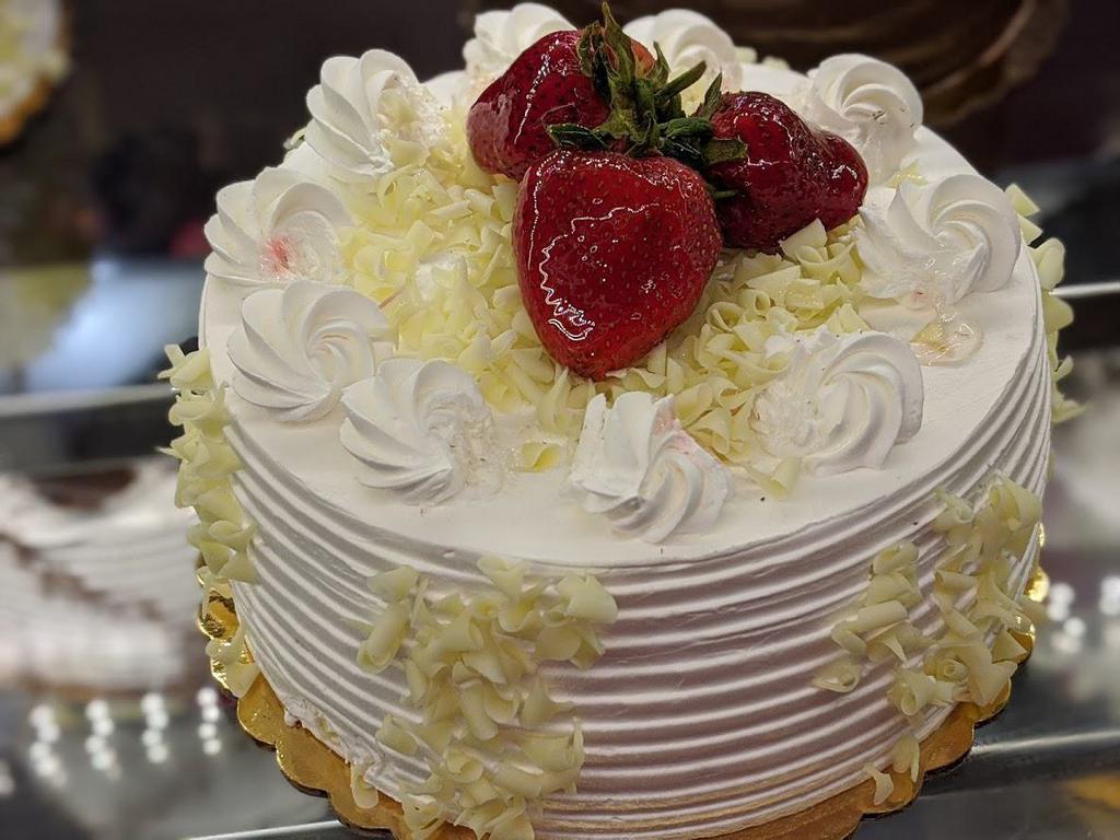 Strawberrry Shortcake · Vanilla Cake with Strawberry Filling and layers of whipped cream (6-8 servings) Please give at least 1 hour for a 10 inch cake