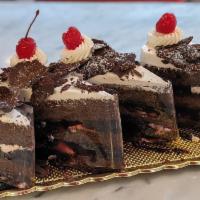 Black Forest Cake Slice · Chocolate cake, black cherries and whipped cream