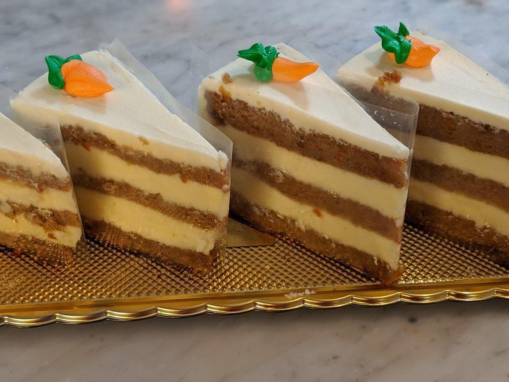 Carrot Cake Slice · Carrot cake, raisins and cream cheese icing