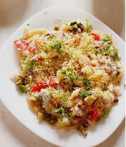 Dahi Aloo Papri  · A light and refreshing mixture of crisps, potatoes and chickpeas in a tamarind, mint chutney and yogurt.
