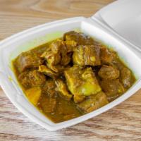 Curry Goat Dinner · Curry seasoned dish. 