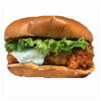 Chicken Sandwich  ·  Crispy fried chicken breast dipped in sweet and spicy buffalo sauce, red pepper aioli, pick...