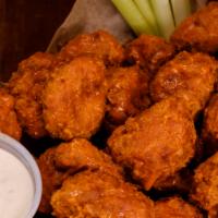 Boneless Chicken Wings · Served with nomemade dressing and celery.