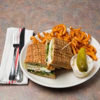 Chicken Cutlet Panini · Chicken cutlet with fresh mozzarella, tomatoes, field greens, and pesto sauce.
