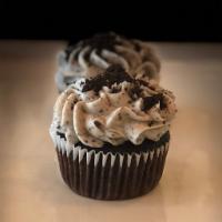 Cookies and Cream Capped Mountains Cupcake · Cakes and cream frosting and chocolate cake.