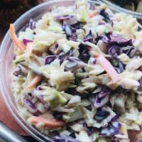 Summer Coleslaw · Chopped cabbage, carrots, onion and crisp apples are brought together with a house creamy dr...