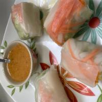 1. Salad Roll  · 2 pieces. Rice paper wrapped with vegetable, tofu, and rice noodle, served with peanut sauce.