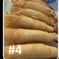 4. Shrimp Roll · 6 pieces. Deep-fried tasty shrimp in egg roll wrapper, served with sweet and sour sauce.