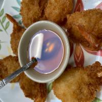 6. Shrimp Tempura · 7 pieces. Golden fried shrimp in tempura batter served with sweet and sour sauce.