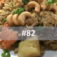D82. Pineapple Fried Rice · Chicken and shrimp with egg, pineapple, onions, tomato, peas and carrots, cashew nuts.