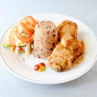 Fried Chicken · Includes a side of white rice or rice and peas and salad.