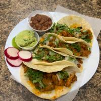 Tacos Al Pastor · Four in the order comes with onion, cilantro, radish, and guacamole. (Cuatro en La Orden Aco...
