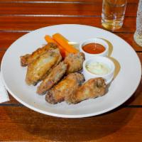 Confit Chicken Wings · Aleppo hot sauce, Parmesan aioli, pickled celery, pickled carrots.