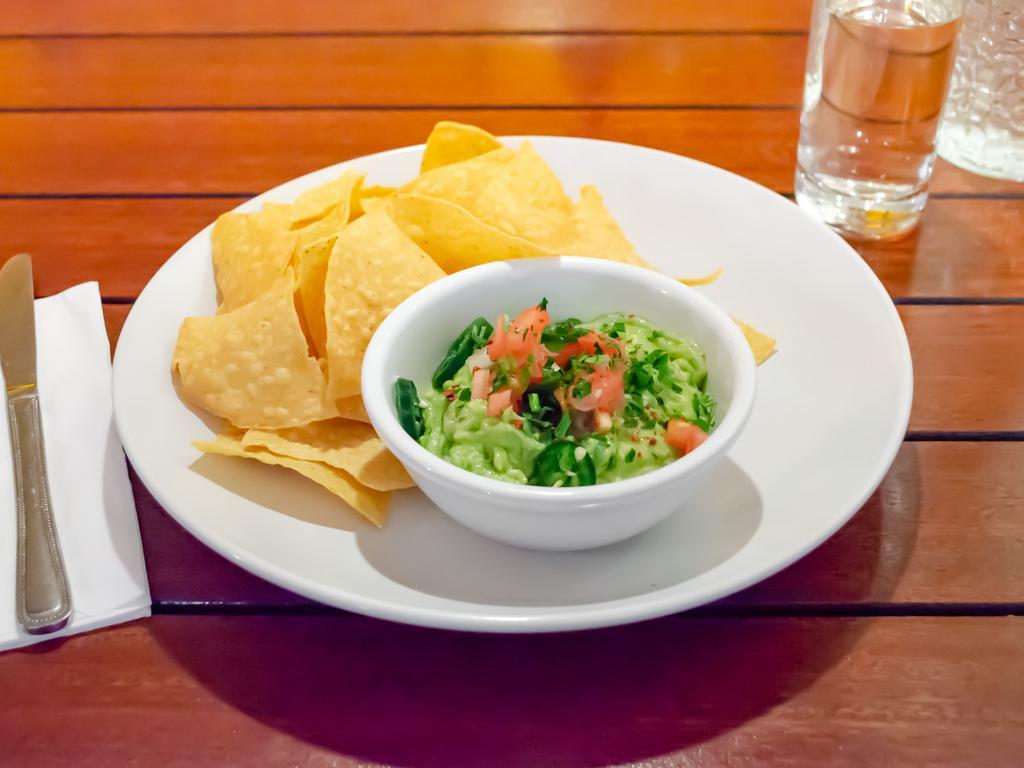 Guacamole & Chips · Signature house-made guacamole to order, corn tortilla chips. Vegan, gluten free.