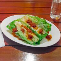 Caesar Salad · Romaine sphere cups filled with caesar dressing, grated Parmesan, bread crumbs, sun-dried to...