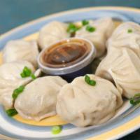 28. Dumpling · 8 pieces. Choice fried or boiled.
