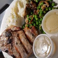 Jumbo Pork Chops · Pork Chops can be ordered Grilled or Breaded, served with apple sauce,  a vegetable of the D...