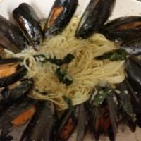 Mussels over Linguini · Mussels Red or White served over Linguini. Served also with a Soup of the Day or House Salad.