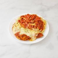 Parmigiana Chicken · Fresh chicken breast breaded in marinara sauce and topped with melted mozzarella. Served wit...