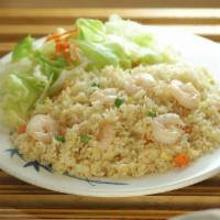 Fried Rice · Fried rice with your choice of protein. Served with a side salad and house made dressing.