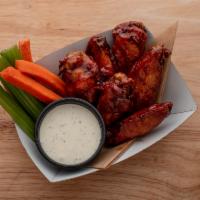Bone-In Wings · Bone-In wings with carrots and celery.  Your choice of wing flavor, up to 2, and ranch or bl...