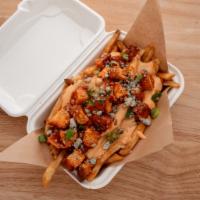 Buffalo Chicken Fries · French Fries topped with Smothered Buffalo Chopped Chicken Tenders, topped with Cheddar Chee...