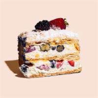 Fruit Napoleon · This Fruit Napoleon consists of rich custard filled with fresh berries, layers of mousse & f...