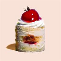 Strawberry Short Cake · Delicious layers of dense, buttery and moist vanilla short cake filled with fresh whipped va...