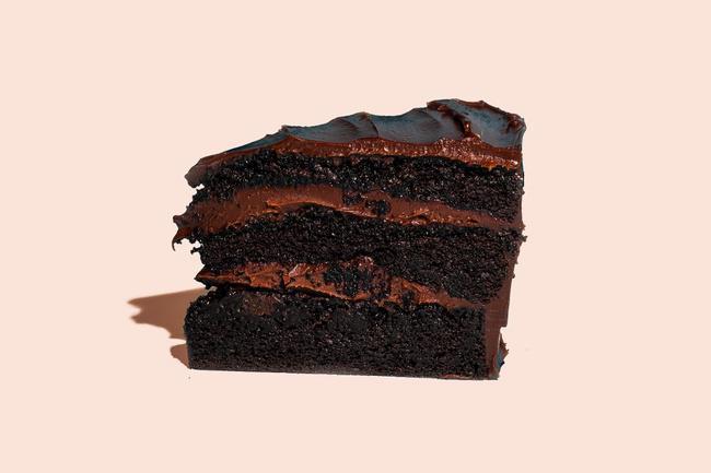 Chocolate Fudge · A very chocolatey, moist Chocolate Fudge Cake that is similar to chocolate mud cake, but not as dense. Made with both melted chocolate & cocoa, AND topped with chocolate ganache, this one is sure to satisfy your chocolate cravings!
