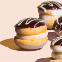 Mini Coques · Mini cream puffs with a fabulously rich pastry cream filling & decadent chocolate ganache gl...