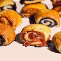 Croissant Twists (rugelach) · Satiny soft dough wrapped around a filling of melted cocoa or raspberry : that's rugelach. O...