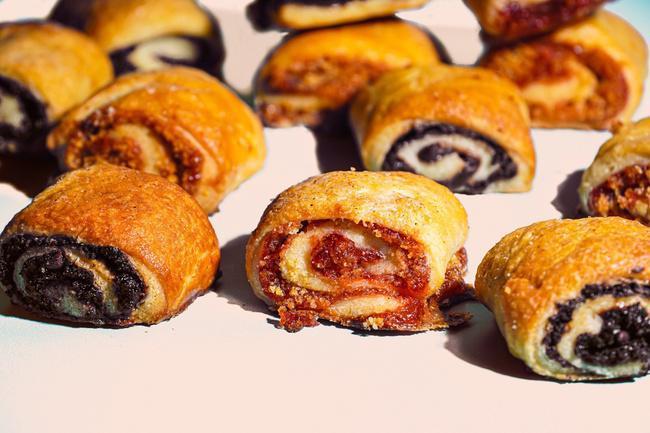 Croissant Twists (rugelach) · Satiny soft dough wrapped around a filling of melted cocoa or raspberry : that's rugelach. Once baked, the traditional Eastern European cookie flakes like a Danish or croissant, its buttery flavor the perfect foil for the sweet filling within.
