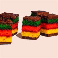 Rainbow Cookies · Moist, colorful, smooth.

What you may not realize about rainbow cookies is that they aren...