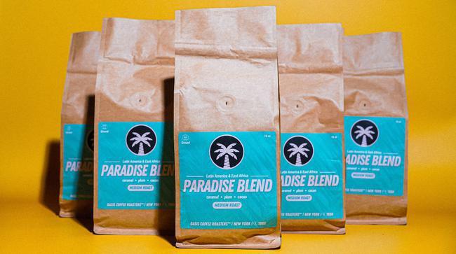 OASIS® PARADISE BLEND® · (16oz Ground Drip Coffee) 
Oasis’ Paradise Blend - a seasonal blend of exceptional coffees sourced from Latin America & East Africa. Together these coffees are sweet, balanced & full bodied which make an excellent crowd pleasing brewed coffee. This blend will be available year round & while the components will change seasonally, the coffee will remain consistent, complex & delicious with notes of bittersweet chocolate, toasted marshmallow, candies orange & praline.

BREW AT PEAK DELICIOUSNESS: Sourced with care & delivered to you within 48 hours of roasting, our coffee is always fresh.
Tasting Notes : Nutty Cocoa, Fruity, Sweet, Dark Chocolate, Hazelnut, Caramelized.