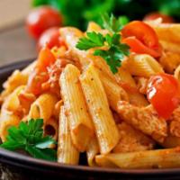 Penne alla Vodka Sauce  · Tender penne pasta tossed in a rich and delicious tomato, vodka, and cream sauce.