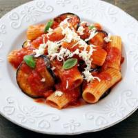 Eggplant Parmigiana Pasta · Eggplant breaded in crispy breadcrumbs, then laid in a delicious bed of tomato basil sauce, ...