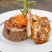 Pollo a la Cubana · Pan roasted french cut chicken breast in a garlic mojo served with black bean moro rice and ...